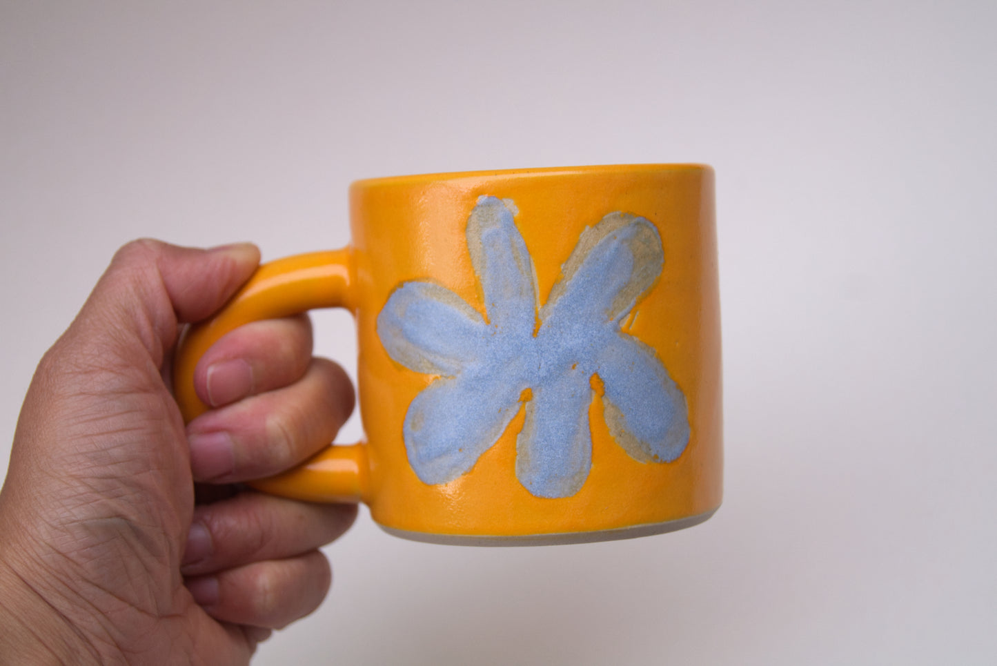 Orange flower mug